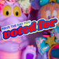 A close-up of a colorful plush toy with a purple body, large yellow eyes, and a flower crown, alongside other bright stuffed animals and sequined accessories. A large text overlay reads 'HAVE THE DAY YOU voted for'.